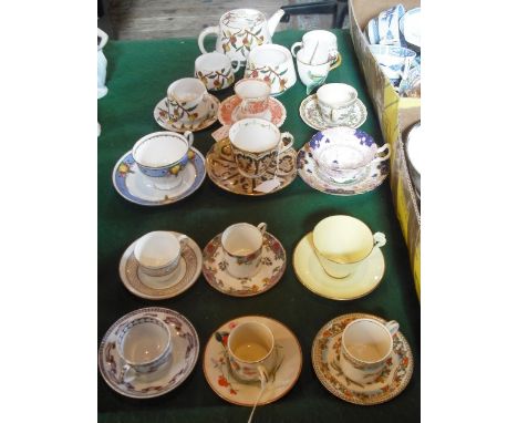 A late 19th century Aesthetic Movement part-tea set and a group of 19th century and later English cabinet cups and saucers.