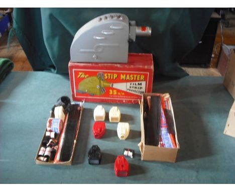 A boxed 'Stip Master' film projector, together with accessories and related items.