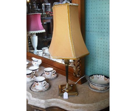 An alabaster table lamp of vase shaped form, with shade and another, brass.