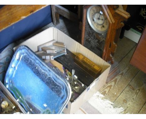 A rosewood cribbage board, a quantity of plated flatware, a mantle clock and various other items.