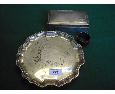 A silver salver with piecrust border on tripod supports, maker SRT & Co., London, 1967, 12oz, together with an engine turned 