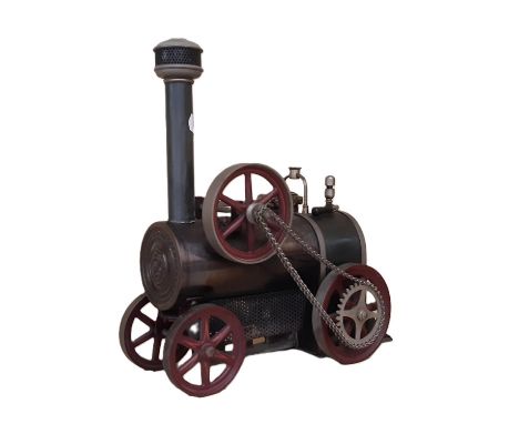 Early 20th century chain driven live steam traction engine by Gebruder Bing with early name plate to smokebox door. Length 22