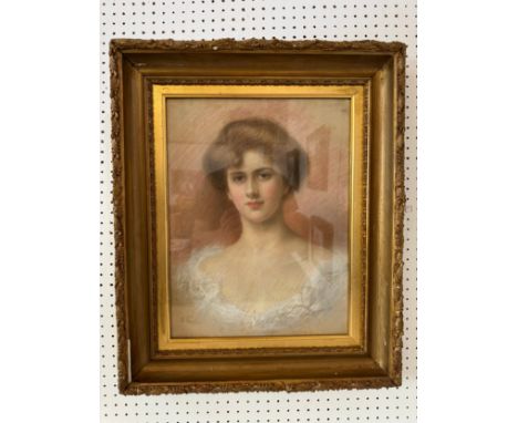 E. Taylor (19th-20th Century) - Portrait of a young lady in a white dress, quarter-length (early 20th century), signed lower 
