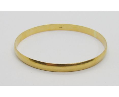 Middle Eastern 21ct bangle, 6.4cm diameter approx, 15.8g 