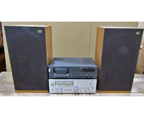 A Aiwa stereo integrated amplifier 8300, a NAD Dolby stereo cassette tape deck 6050c together with a pair of Monitor audio fl