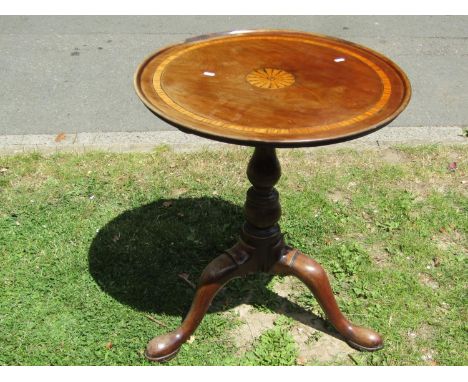 A Georgian mahogany occasional table the possibly associated circular tray top with satinwood banding and further inlaid deta