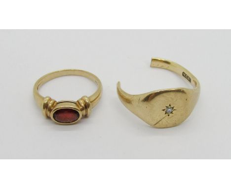 Byzantine style 9ct oval garnet dress ring, size N and a 9ct diamond set signet ring (cut), 8.4g total (2) 