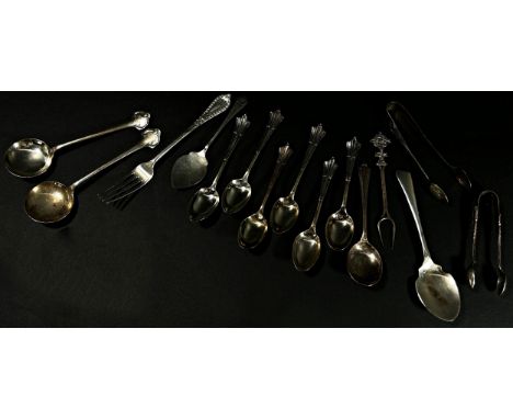 An art deco set of silver coffee spoons and sugar tong, Birmingham 1922, in original box, a quantity of loose silver cutlery,