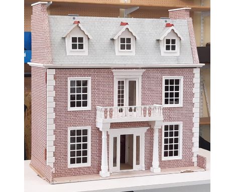 3 storey dolls house in the style of a period red brick town house with hinged front and roof, complete with furniture and do