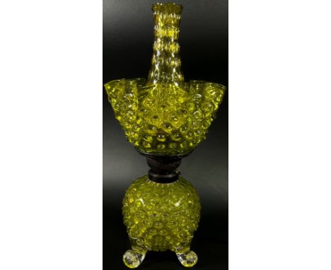 A decorative Victorian yellow glass oil lamp with nobbled globular bowl raised on scrolled legs with matching shade and chimn