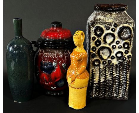 An unusual salt glazed Studio ware model figure of stylised proportions 31 cm high together with a West German ceramic vase o