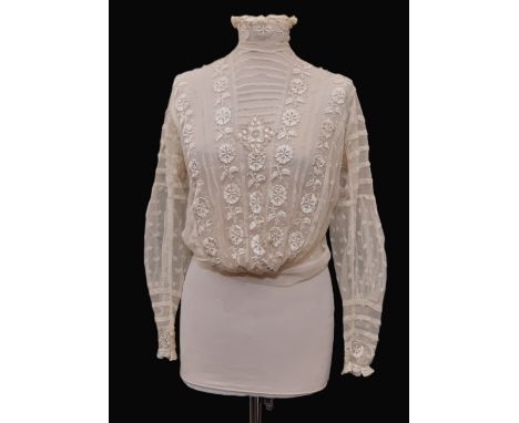 Edwardian ladies' blouse of embroidered lace net with high collar trimmed with hand made lace, tight fitted cuffs and pigeon 