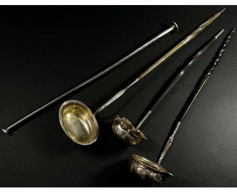 Three Georgian silver toddy ladles, a silver plated listening tube a Ronson table lighter and a commemorative B P Forties Fie