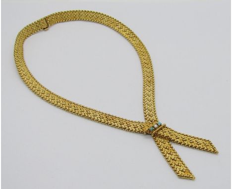 Vintage 18ct fancy ribbon design necklace set with a single diamond, 0.10ct approx, flanked by two turquoise cabochons, 88.4g