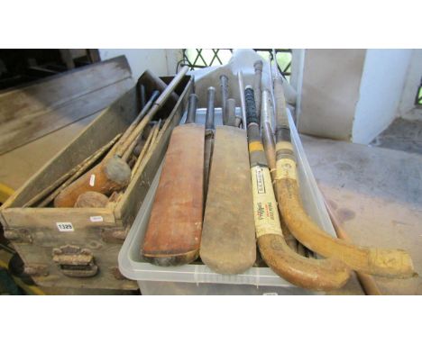 An English sporting collection to include vintage croquet mallets and hoops etc set within a banded pine case together with m