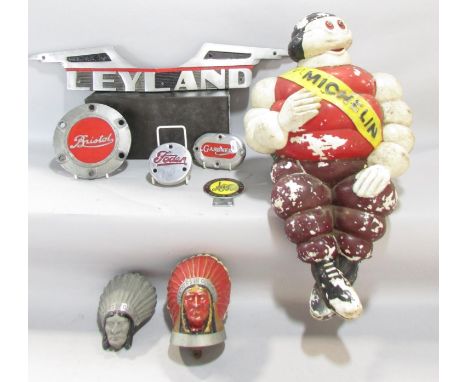 Automobilia interest - a large vintage Michelin man advertising figure in seated pose, 43 cm high together with a large Leyla