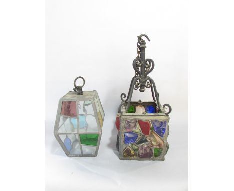 A cubic leaded multi coloured glass lantern, 13.5 x 13.5cm with a scrolled fixing and another smaller “cable car” shaped lead
