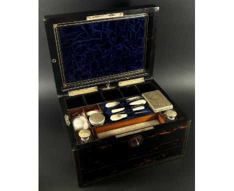 A good 19th century coromandel veneered travelling vanity case, with a fitted divisional interior lined in tooled blue leathe