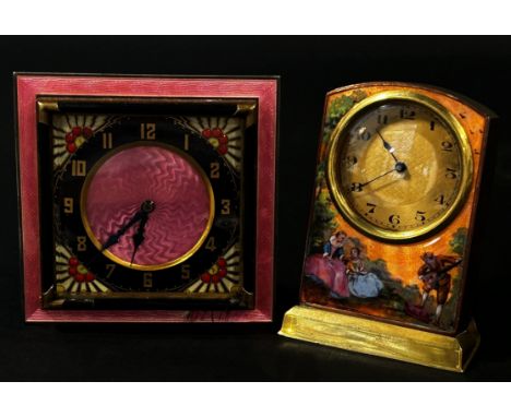 A small brass-cased desk timepiece with enamelled frame decorated with a musician wooing ladies, 9cm high,  together with ano