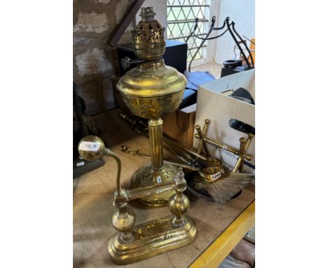 Mixed group of antique brass oil lamp and fireside tools, fire dogs etc. 