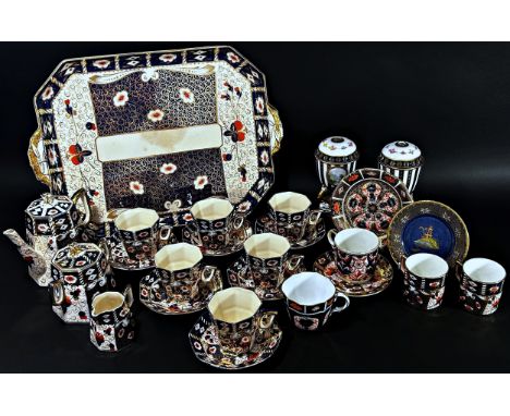A quantity of Royal Crown Derby Imari pattern coffeewares to include six octagonal coffee cans, four various other coffee can