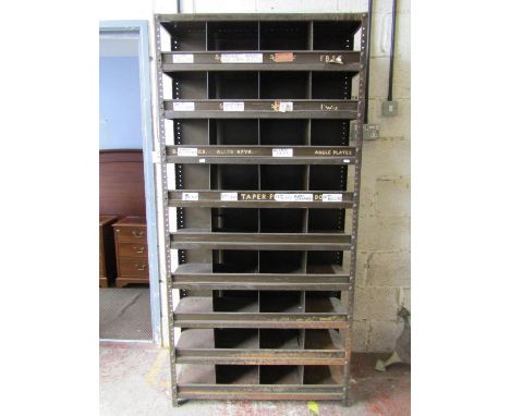 A vintage industrial / workshop bank of 36 pigeon holes, with remnants of content guides, 191cm high, 92 x 31cm 