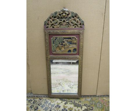A Chinese framed dressing mirror with carved and lacquered panels above and below, together with a small Chinese wall mirror 