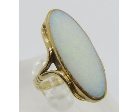 Arts &amp; Crafts style 9ct oval cabochon opal dress ring, maker 'OL', Sheffield 1993, size Q, 8.4g (worn) 