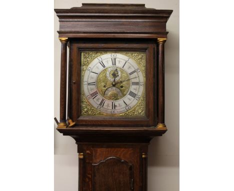 A late 18thC eight day longcase clock, the caddy top holding a 29cm dia. dial with silvered chapter ring signed Shepley Stock