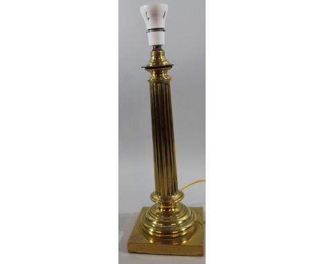 A late 20thC brass column table lamp, with modern fittings and square base, 46cm high.