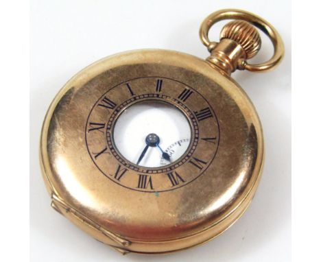 A mid 20thC Dennison half hunter gold plated pocket watch, with outer stencilled Roman numeric dial, 5cm dia. face with Arabi