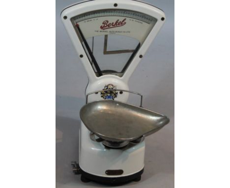 A mid 20thC Berkel shop scale, with fan top, raised on shaped based with removable metal pan, with printed marks, 56cm high, 