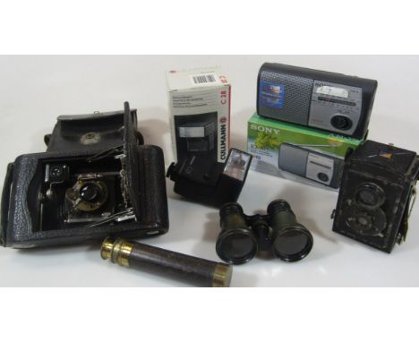 Various cameras optical equipment etc., to include a brass three drawer telescope with leather centre of cylindrical outline,