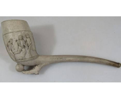 An early 20thC clay football pipe, with football and boot stem, marked RDNO21693, 92cm wide. 