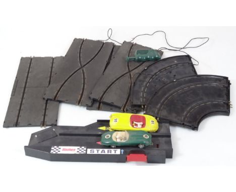 A mid 20thC Playcraft French patent Scalextric style racing car, in green, numbered 3, 10cm wide, and another, similar, in ye