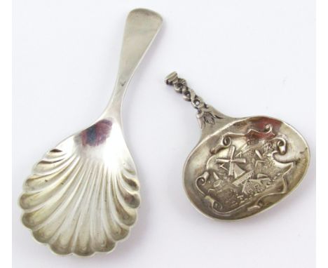 A George VI silver caddy spoon, Old English pattern with feathered bowl, 10cm wide, Birmingham 1949, and a Dutch caddy spoon 