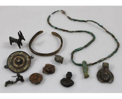 Various medieval and other artefacts, ground finds, etc., to include a Roman lock cover, 4cm high, Celtic style mount, a KP s