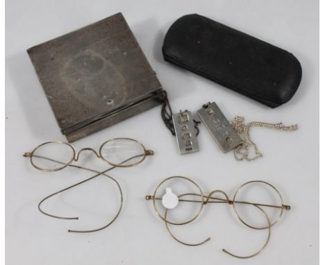 Various silver, comprising of a cigarette case, two ingots and a pair of gilt coloured spectacles with curved side bars, 11cm