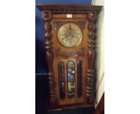 Late 19th C walnut cased sprung driven Vienna wall clock