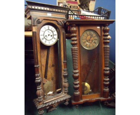 Late 19th C walnut cased double weight Vienna wall clock and similar sprung driven Vienna wall clock