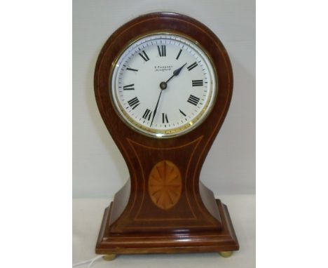 Edwardian E Sweeney of Bradford satin wood balloon clock with decorative inlay on four brass bun feet and French movement