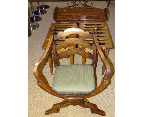 A modern walnut coffee table in the form of a butler's tray and stand, two brass-mounted trunk stands and an X-frame chair, (