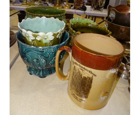 A Bretby green-glazed jardinière, other ceramic jardinières and a Doulton Lambeth large tyg transfer-printed with a Victorian