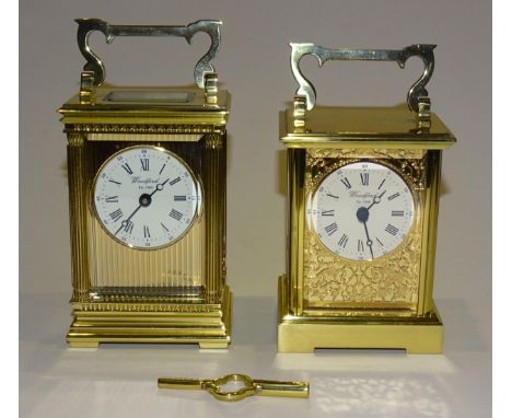 Woodford, a modern brass-cased English carriage clock, the circular dial set with Roman numerals, height 16cm (including hand