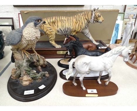 Franklin Mint, 'On The Prowl', a sculpture of a tiger, 55cm long, 25cm high, on wooden rectangular plinth, a Royal Doulton fi