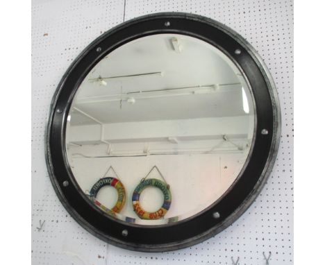 ROUND MIRROR, bevelled plate in black and silvered faux distressed surround with rivet details, 90cm diam.