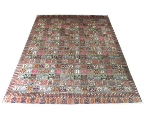 FINE PART SILK KASHMIR CARPET, 310cm x 242cm, all over garden tiled design within corresponding borders.