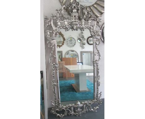 MIRROR, bevelled in a Chinoiserie Chippendale style silver painted border, 202cm x 94cm.