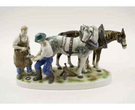 FIGURAL CERAMIC GROUP, 20th century, Continental, portraying farriers and horses, 40cm L x 21.5cm H max.