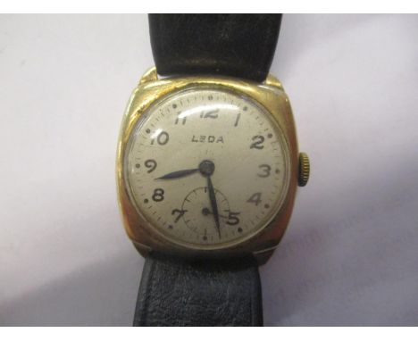 A Ladies 9ct gold Leda manual wind wristwatch on a leather strap 